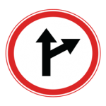 Pakistani compulsory road sign showing a black arrow splitting straight ahead and to the right inside a red circle