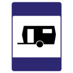 Pakistani informative road sign showing a caravan symbol marking a caravan site