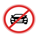 Pakistani road sign showing a black car crossed by a red diagonal line inside a red circle, prohibiting motor cars