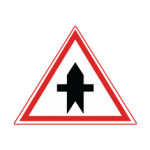 Pakistani cautionary road sign showing a symmetrical crossroads symbol inside a red-bordered triangle