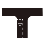 Pakistani road marking showing a broken white give way line across a minor road at a T-junction