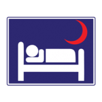 Pakistani informative road sign showing a hospital bed with a red crescent symbol indicating a hospital