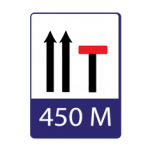 Pakistani motorway sign showing lane arrows with one lane closed by a red bar and the distance 450 M below