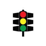 Pakistani traffic signal showing red and amber lights lit together, meaning stop and prepare to move