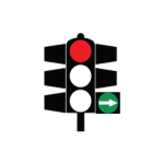 Pakistani traffic signal showing a red light with a green filter arrow pointing right