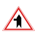 Pakistani cautionary road sign showing a side road joining the main road from the left inside a red-bordered triangle