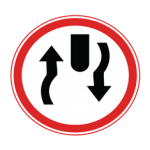 Pakistani road sign showing two black arrows pointing in opposite directions around a central obstruction inside a red circle