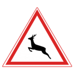 Pakistani cautionary road sign showing a leaping deer inside a red-bordered triangle warning of wild animals